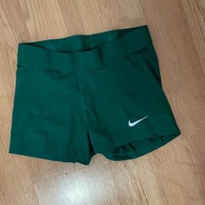 Green Nike compression shorts